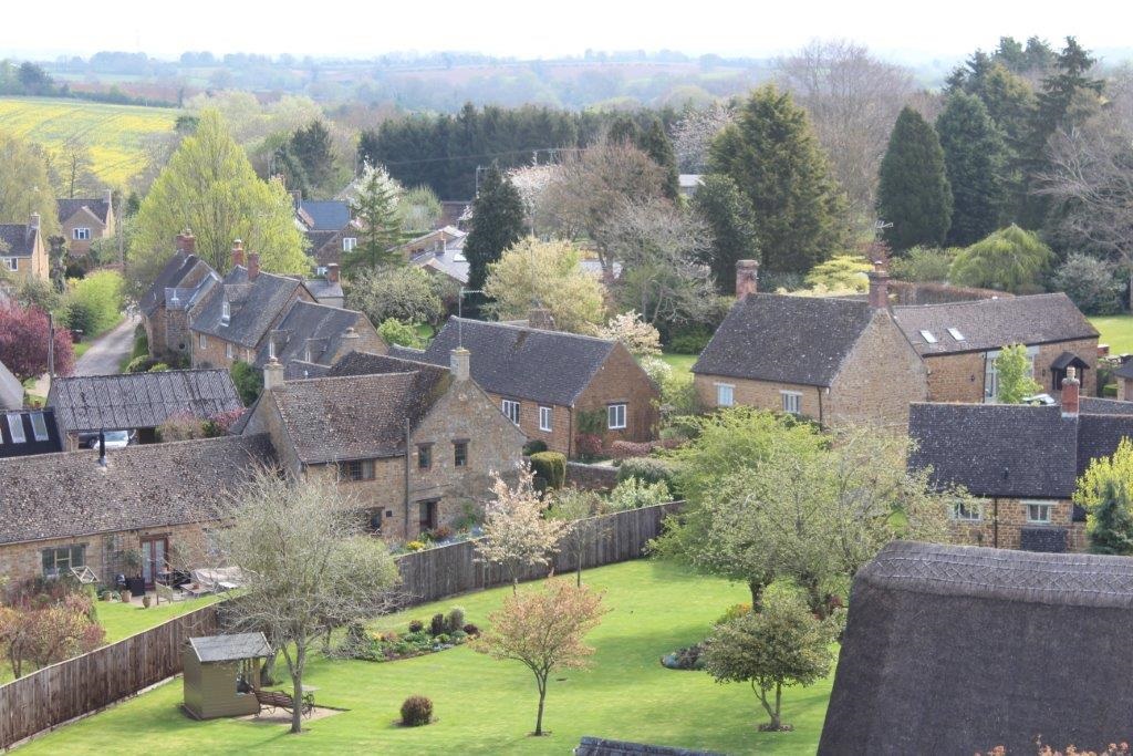 Photograph of several houses from a distance